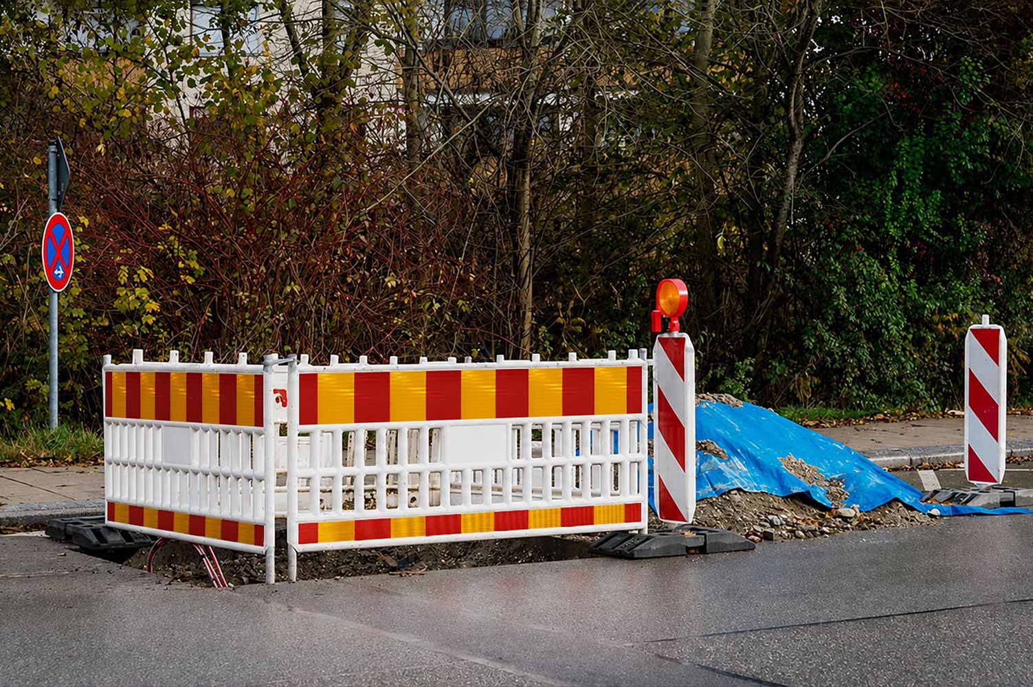 Red and yellow reflective strips applied on pedestrian road construction barricade Red and yellow reflective strips applied on pedestrian road construction barricade